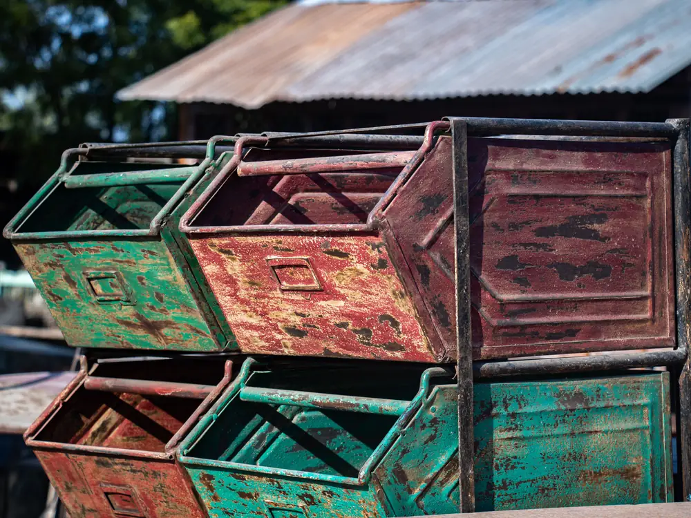 Stacked steel sorting bins at a yard